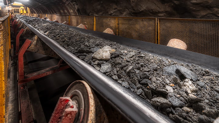 Fire and flame resistant conveyor belt