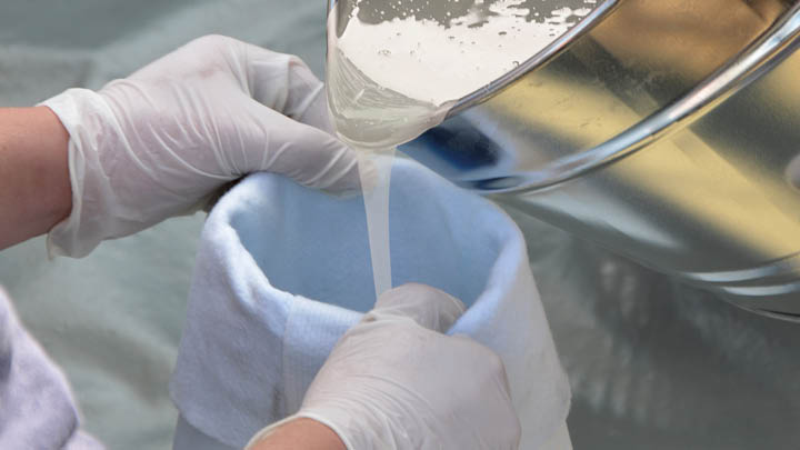 Resin being poured into a pipe liner