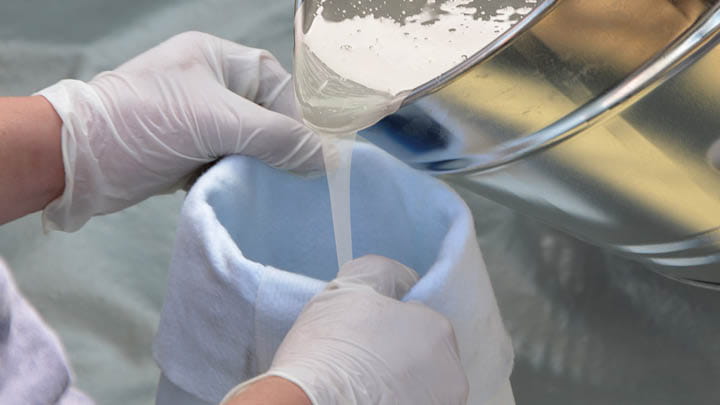 Resin being poured into a pipe liner