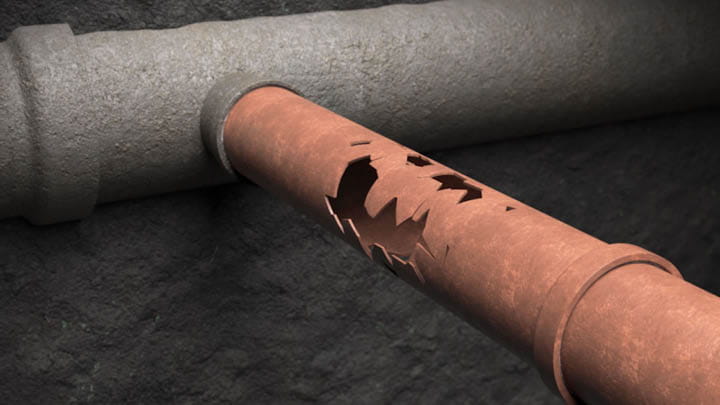 A cracked and fractured lateral pipe, showing significant damage